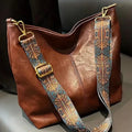 Bolso hobo café con correa bordada boho